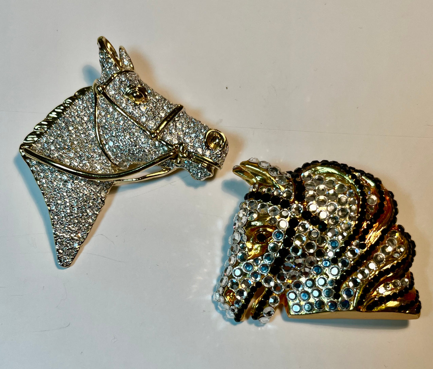 Two Crystal Horse Head Brooches