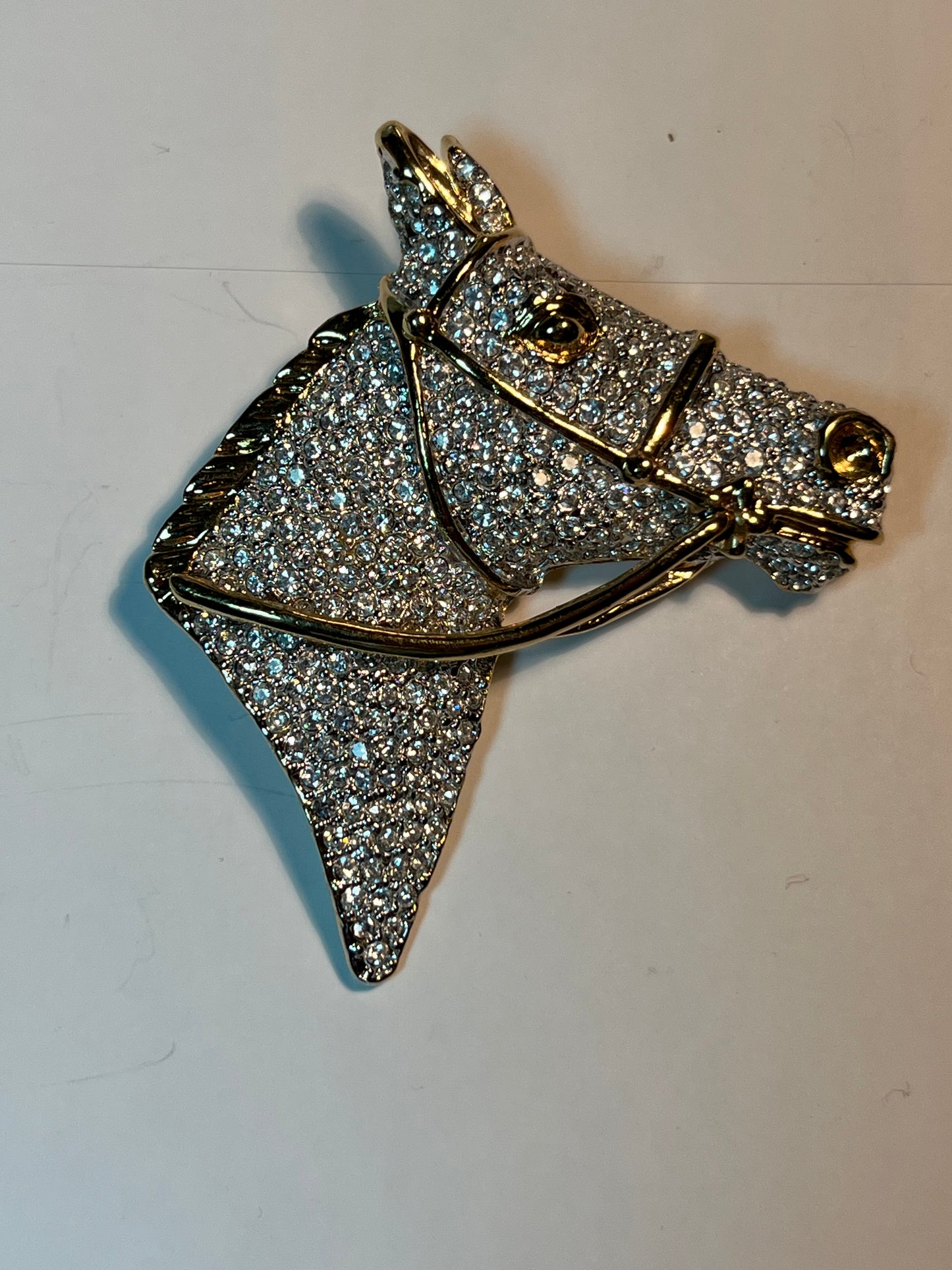 Two Crystal Horse Head Brooches
