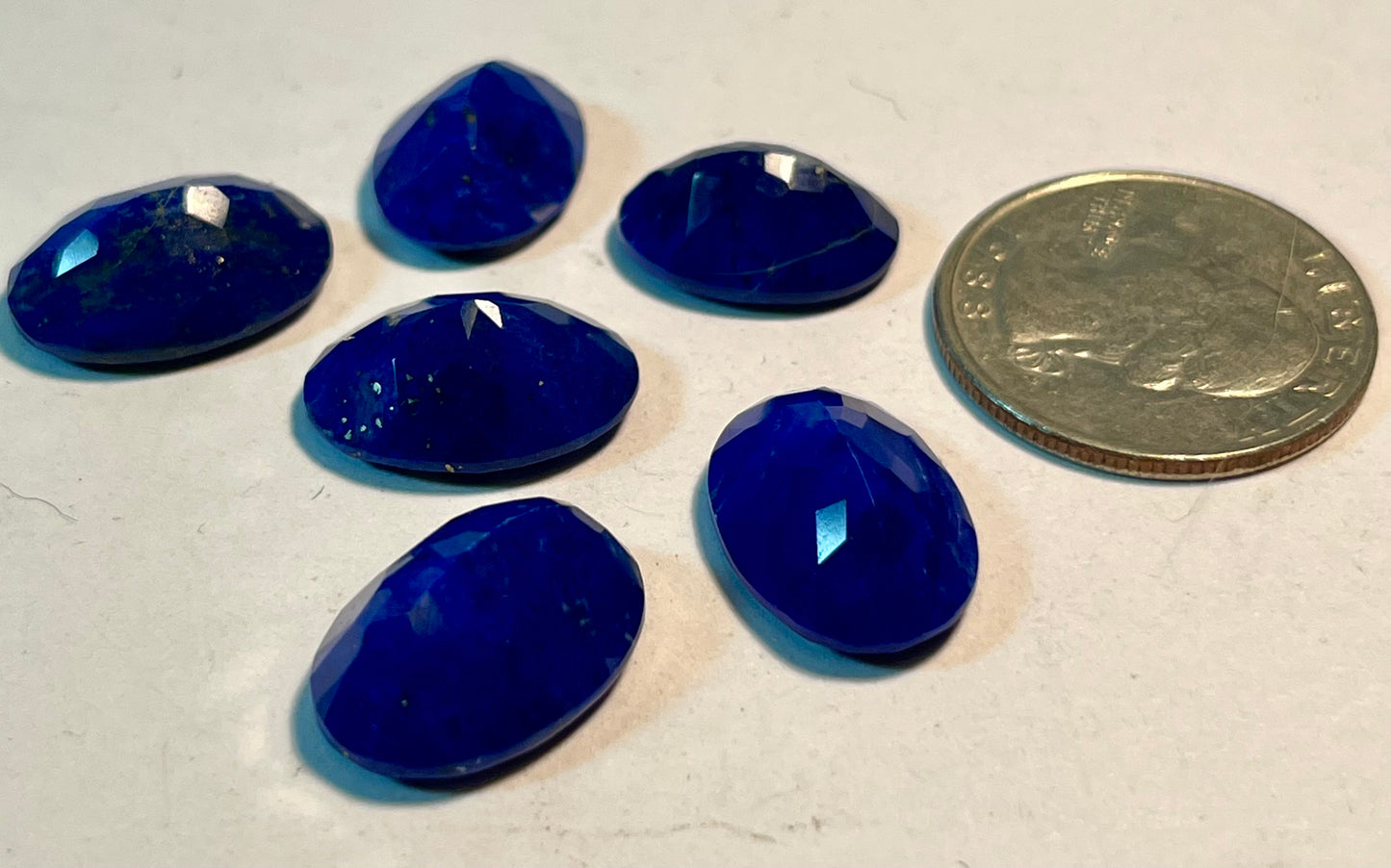 Assortment of Polished Cabochons + Facet-Cut Gems