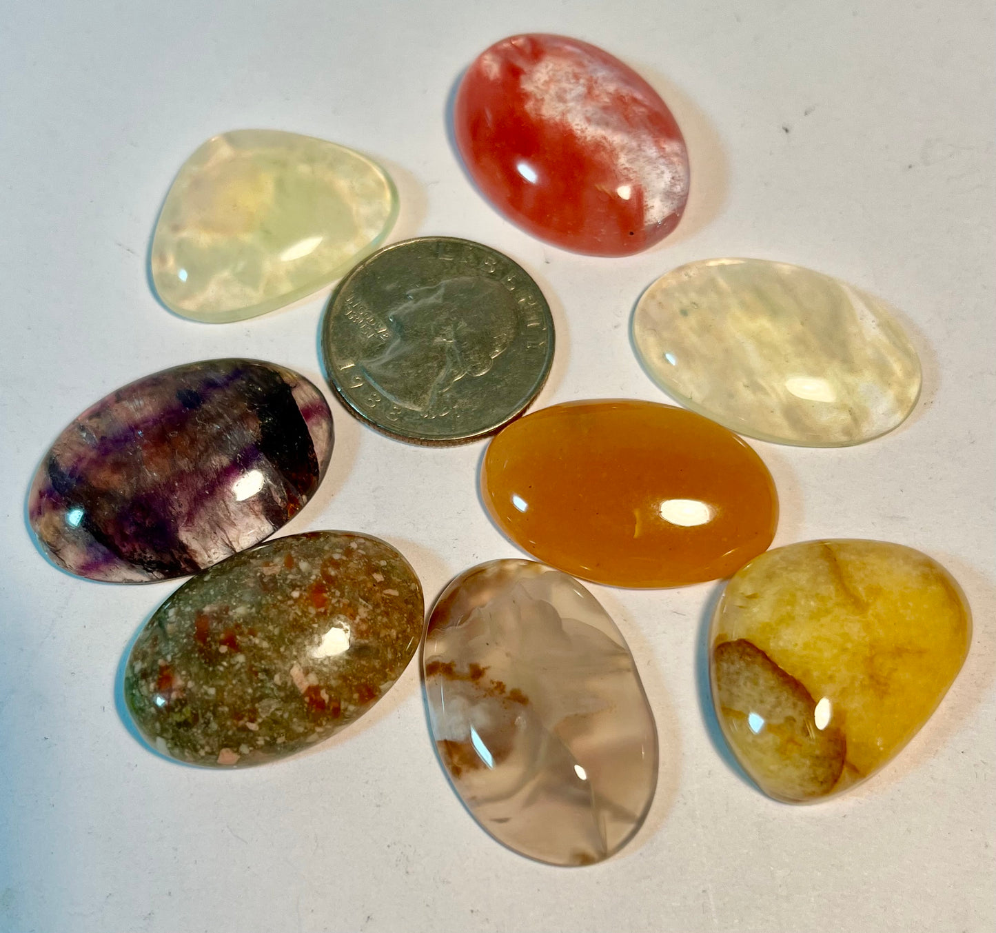 Assortment of Polished Cabochons + Facet-Cut Gems